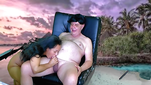 Asian brunette girl sharing with her boyfriend in a threesome