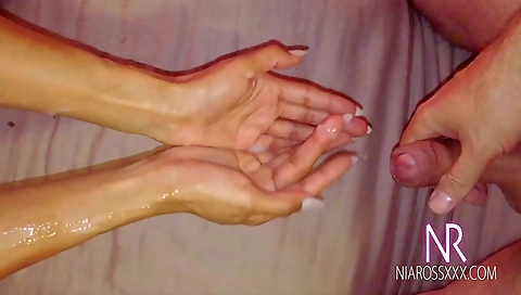 Sexy ebony milf gives a blow job to the cock and her tits