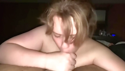 Tattooed MILF with a massive ass gives him a blowjob